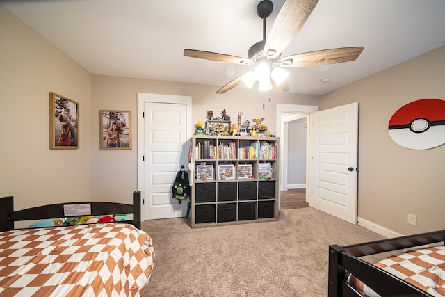 carpeted bedroom with ceiling fan