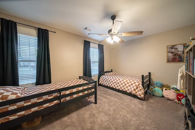 bedroom with carpet and ceiling fan