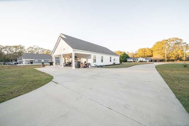 view of home's exterior with a yard