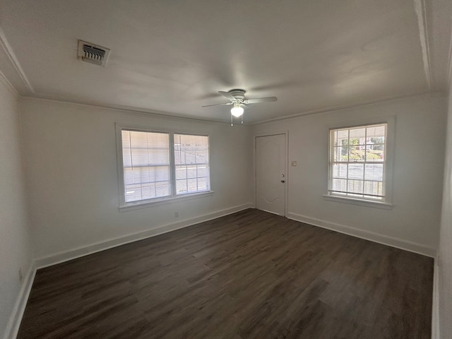 unfurnished room featuring dark hardwood / wood-style flooring and ceiling fan