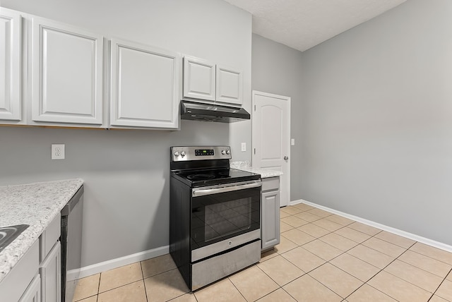 kitchen featuring light tile patterned floors, white cabinetry, and stainless steel electric range