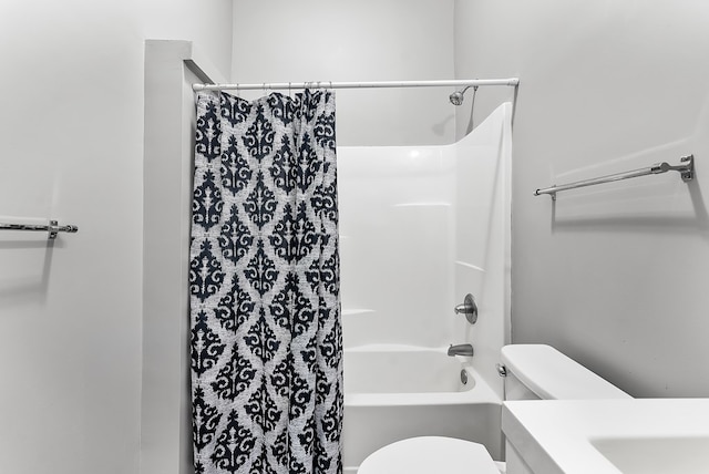 full bathroom featuring vanity, toilet, and shower / tub combo with curtain