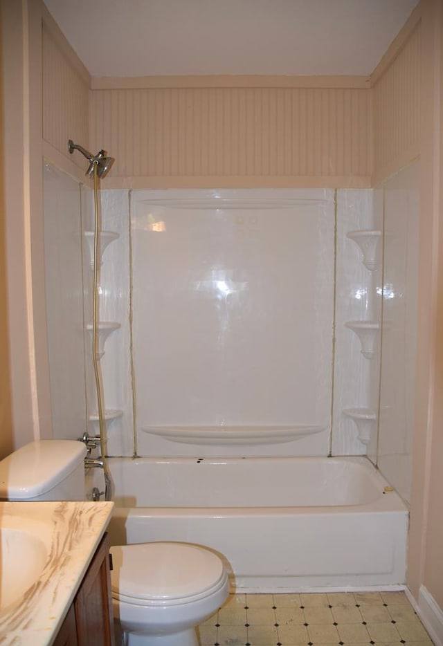 full bathroom featuring vanity,  shower combination, and toilet