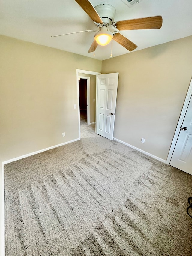 644 Parkwood Dr, Columbus, GA 31907 - unfurnished bedroom featuring carpet flooring, baseboards, and a ceiling fan