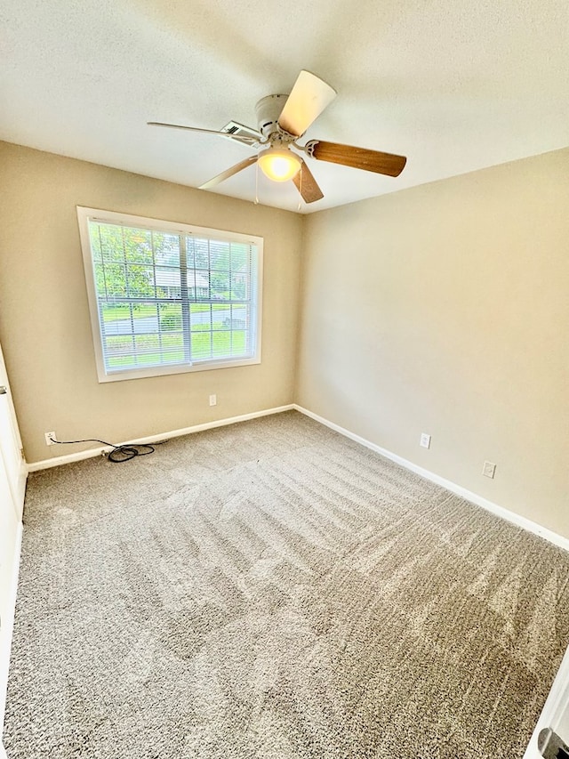 644 Parkwood Dr, Columbus, GA 31907 - spare room featuring a ceiling fan, carpet floors, baseboards, and a textured ceiling
