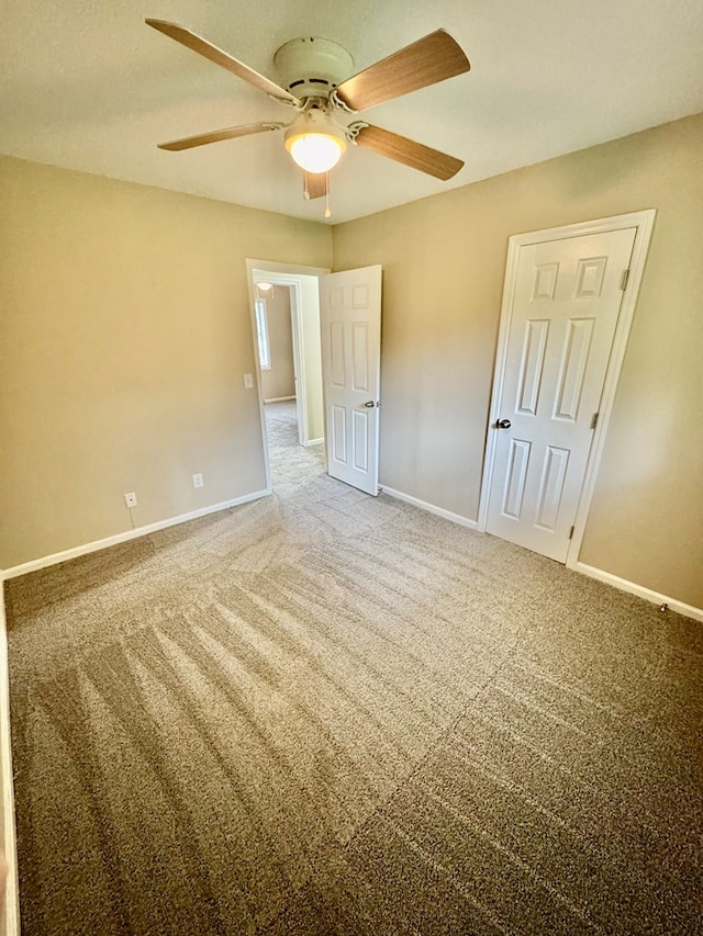 644 Parkwood Dr, Columbus, GA 31907 - unfurnished bedroom with carpet floors, baseboards, and a ceiling fan