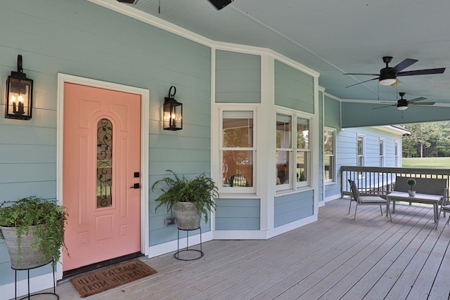 property entrance with ceiling fan