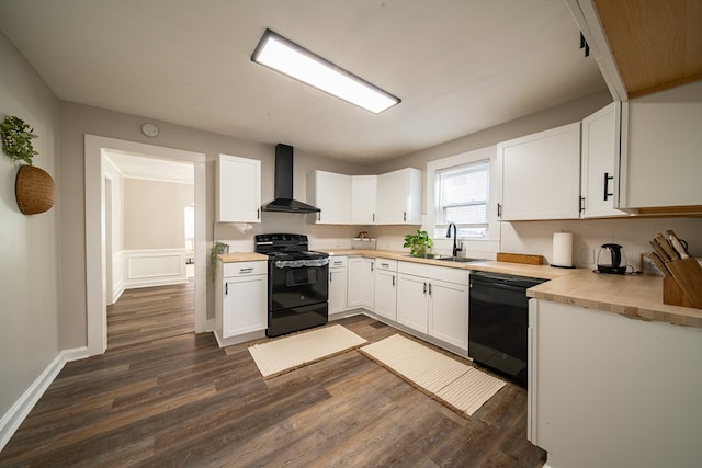 kitchen featuring white cabinetry, sink, wall chimney exhaust hood, dark wood-type flooring, and black appliances