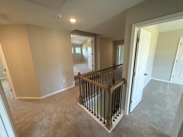 corridor with carpet floors