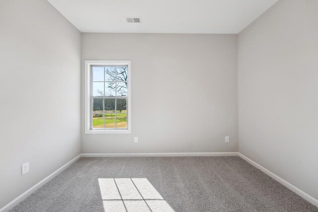 corridor with carpet flooring