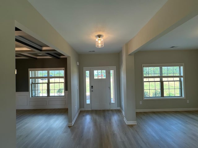 foyer featuring beam ceiling, hardwood / wood-style floors, and coffered ceiling