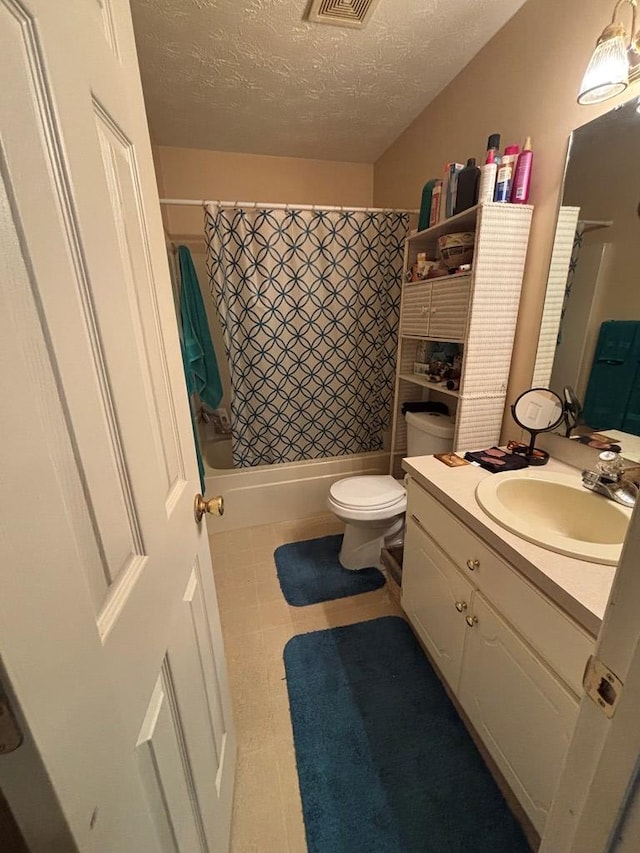 4 Kennedy St, Phenix City, AL 36869 - bathroom featuring vanity, a textured ceiling, shower / bath combination with curtain, and tile patterned floors