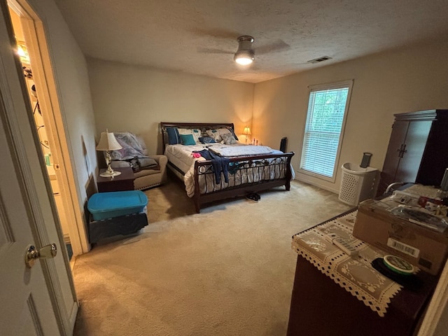 4 Kennedy St, Phenix City, AL 36869 - bedroom featuring carpet, a ceiling fan, and a textured ceiling