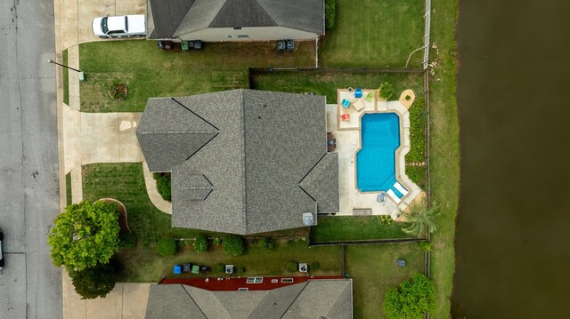 drone / aerial view of a pool
