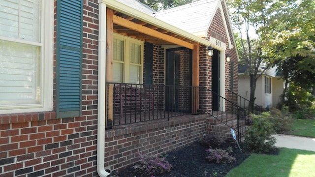 view of property exterior with a porch