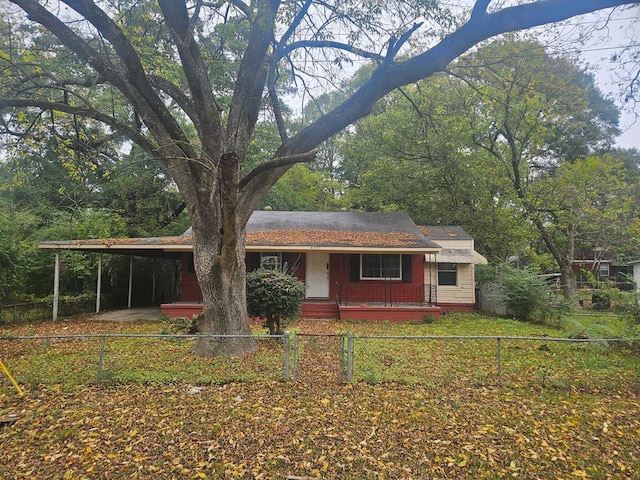 view of front of house with a carport