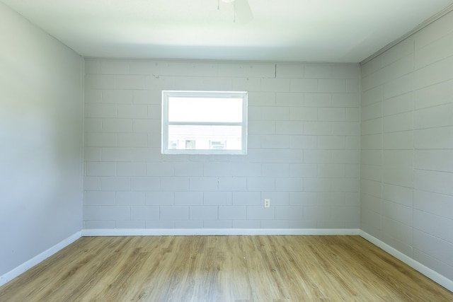 empty room with light wood-type flooring