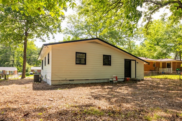 2917 Doyle Ave, Columbus, GA 31907 - rear view of property with central air condition unit, fence, and crawl space