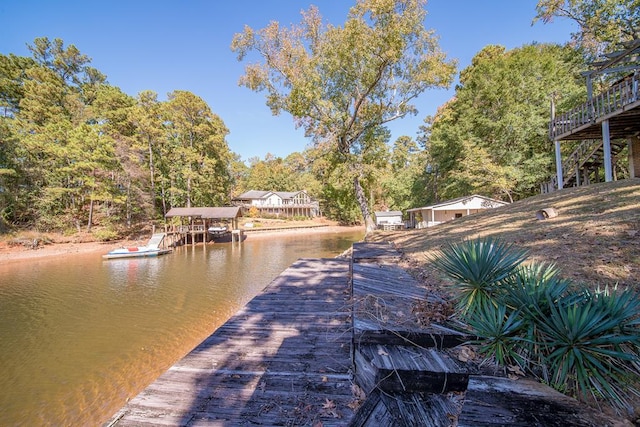 dock area with a water view