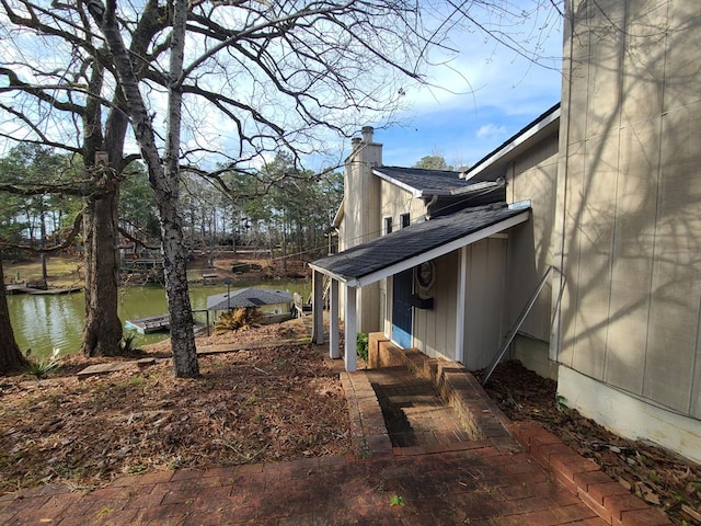 view of side of property featuring a water view