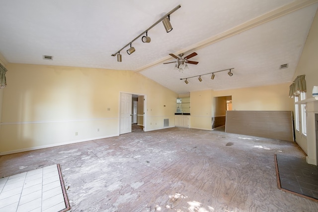 unfurnished living room featuring ceiling fan, lofted ceiling, and light hardwood / wood-style flooring