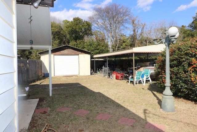 view of yard featuring a storage unit