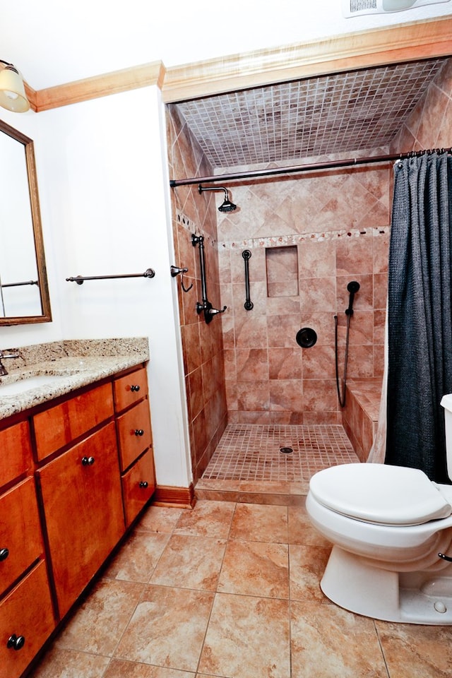 bathroom featuring vanity, crown molding, toilet, and a shower with shower curtain