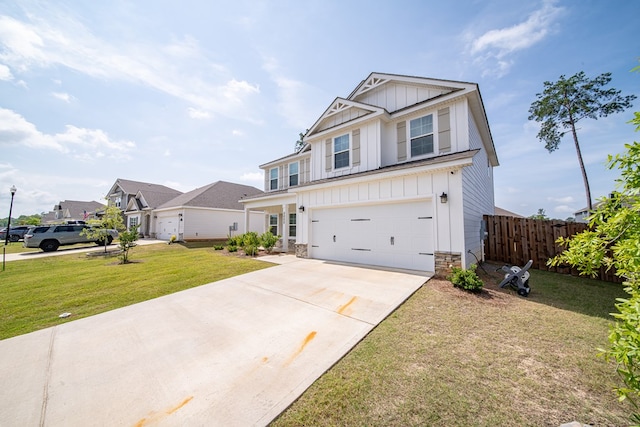 8008 Barton Dr, Midland, GA 31820 - view of front of home with board and batten siding, driveway, a garage, stone siding, and a residential view