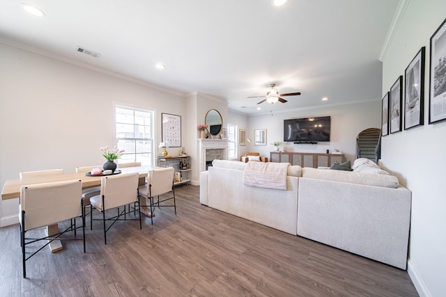 8008 Barton Dr, Midland, GA 31820 - living area featuring crown molding, a ceiling fan, wood finished floors, recessed lighting, and a fireplace