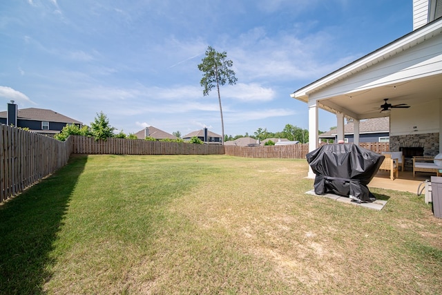 8008 Barton Dr, Midland, GA 31820 - fenced backyard with a ceiling fan