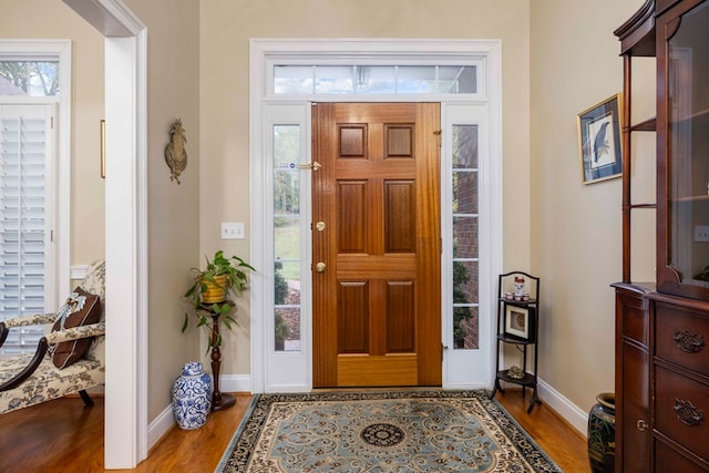 entrance foyer with light hardwood / wood-style flooring