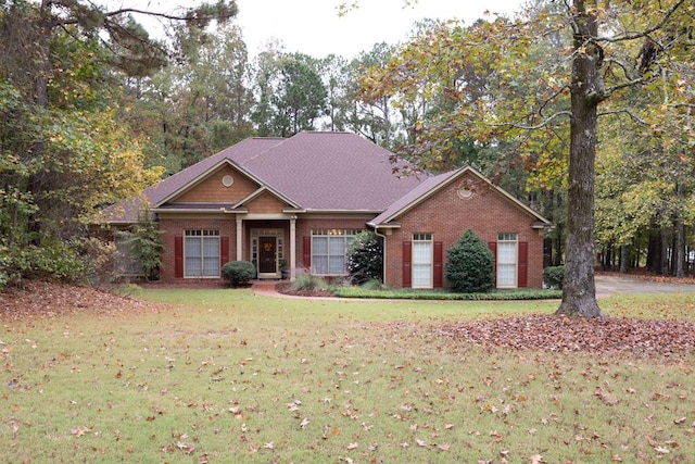 view of front of property with a front lawn