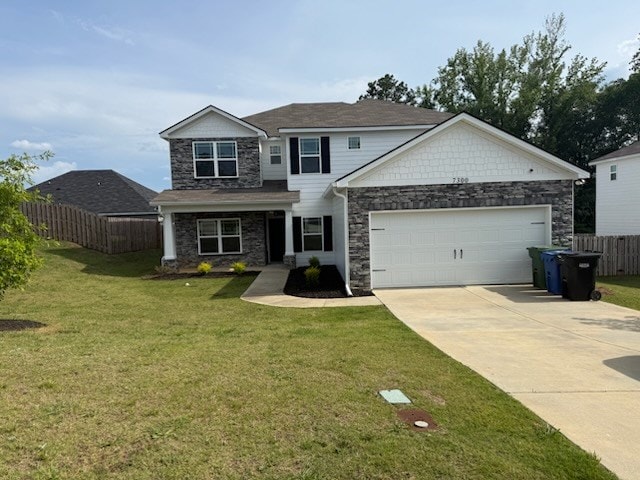 7300 Pine Chase Dr, Midland, GA 31820 - craftsman-style home featuring stone siding, driveway, and an attached garage