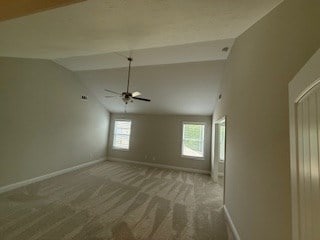 7300 Pine Chase Dr, Midland, GA 31820 - carpeted empty room with vaulted ceiling and ceiling fan