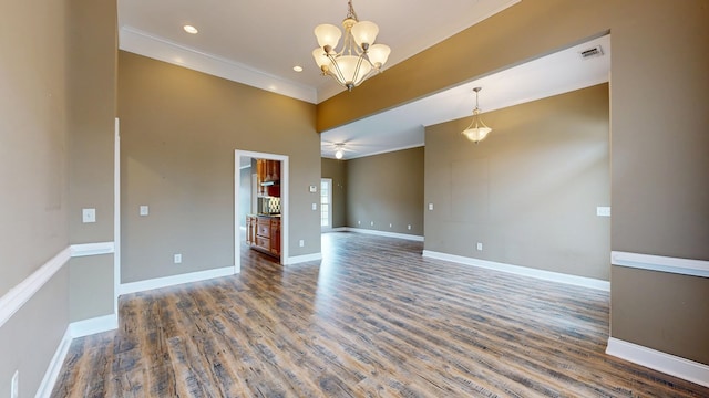 4756 Timarron Loop, Columbus, GA 31909 - spare room featuring a chandelier, crown molding, wood finished floors, and recessed lighting