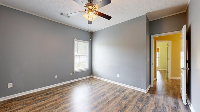 4756 Timarron Loop, Columbus, GA 31909 - spare room featuring wood finished floors, ceiling fan, ornamental molding, and a textured ceiling