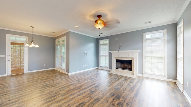 4756 Timarron Loop, Columbus, GA 31909 - unfurnished living room featuring wood finished floors, ceiling fan, a chandelier, healthy amount of natural light, and ornamental molding