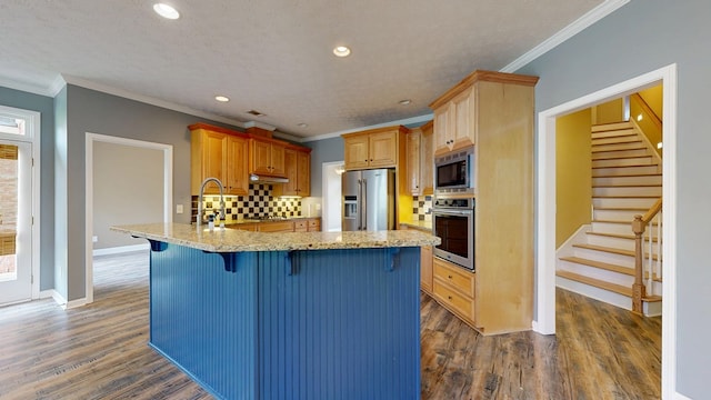 4756 Timarron Loop, Columbus, GA 31909 - kitchen with stainless steel appliances, a peninsula, dark wood-type flooring, tasteful backsplash, and recessed lighting