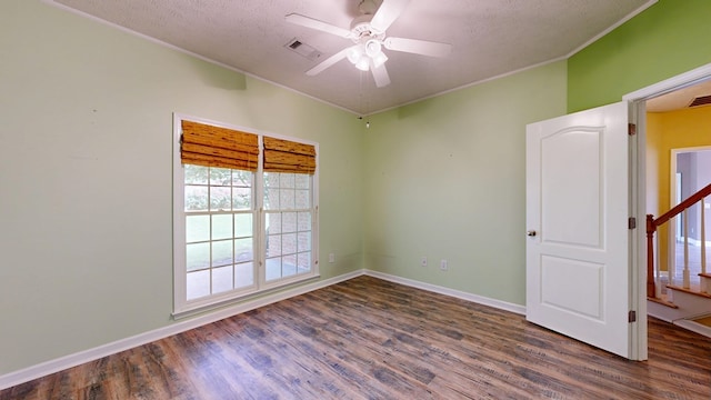 4756 Timarron Loop, Columbus, GA 31909 - spare room with wood finished floors, ornamental molding, a ceiling fan, stairs, and a textured ceiling