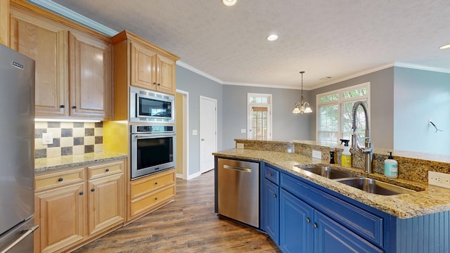 4756 Timarron Loop, Columbus, GA 31909 - kitchen featuring appliances with stainless steel finishes, blue cabinetry, dark wood-style floors, decorative backsplash, and recessed lighting
