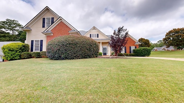 4756 Timarron Loop, Columbus, GA 31909 - view of front of property featuring brick siding and a front lawn
