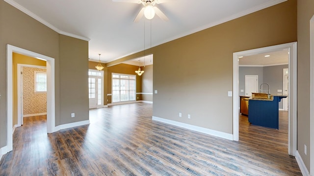 4756 Timarron Loop, Columbus, GA 31909 - unfurnished room featuring a ceiling fan, dark wood finished floors, crown molding, and a chandelier