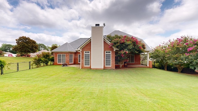 4756 Timarron Loop, Columbus, GA 31909 - rear view of house with brick siding and a chimney