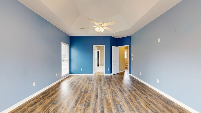 4756 Timarron Loop, Columbus, GA 31909 - unfurnished bedroom with wood finished floors, a raised ceiling, and a ceiling fan