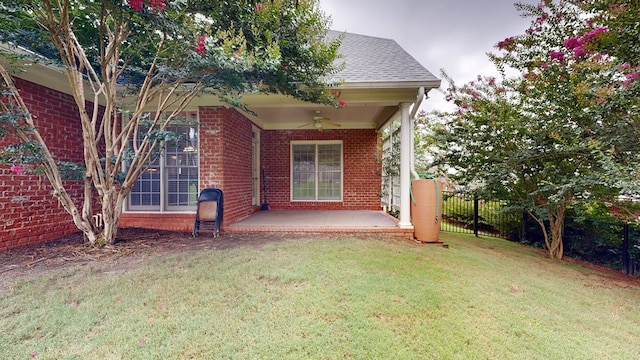 4756 Timarron Loop, Columbus, GA 31909 - rear view of house with brick siding, a ceiling fan, a shingled roof, and a patio area