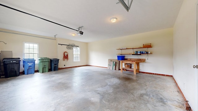 4756 Timarron Loop, Columbus, GA 31909 - garage featuring baseboards and a garage door opener