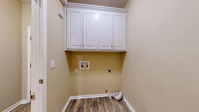 4756 Timarron Loop, Columbus, GA 31909 - washroom featuring wood finished floors, electric dryer hookup, hookup for a washing machine, gas dryer hookup, and cabinet space