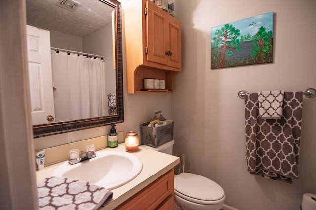 5063 3rd Ave, Columbus, GA 31904 - full bathroom featuring vanity, a textured ceiling, and curtained shower
