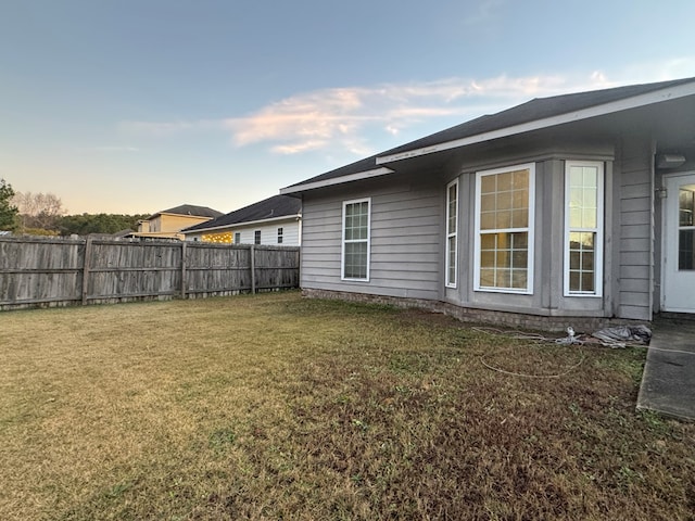 exterior space with a lawn