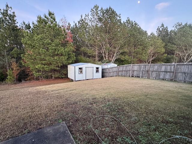 view of yard with a storage shed